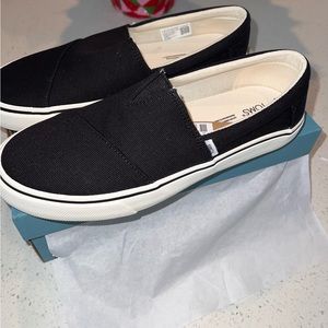 Brand new in box black Tom’s Alpargata Fenix slip-ons